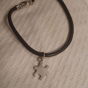 Retired James Avery Leather & Puzzle Piece Bracelet